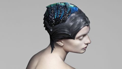 This headpiece, made of 4000 conductive Swarovski stones, changes color to correspond with localized brain activity.