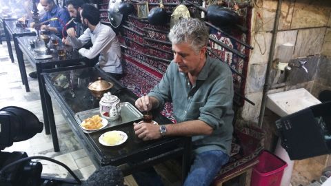 Bourdain stops for tea in a bazaar in Iran.