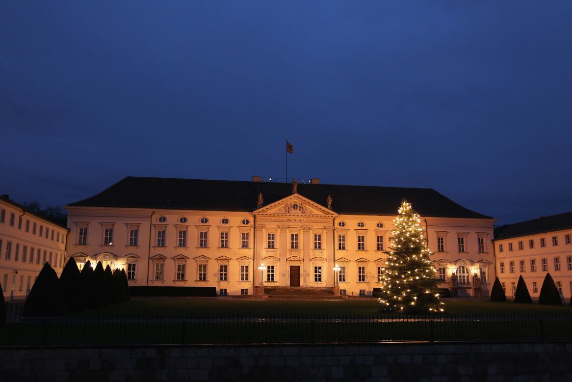 Schloss Bellevue presidential palace, or Bellevue Palace, is illuminated at sunset in Berlin on January 3, 2012.
