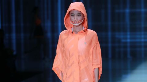 The QIAODAN Yin Peng Sports Wear Collection during Mercedes-Benz China Fashion Week capitalized on China's smog problem by incorporating stylish face masks.