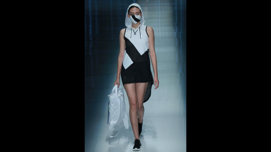 A model wears a look -- complete with a coordinating face mask -- for the spring/summer QIAODAN Yin Peng Sports Wear Collection.