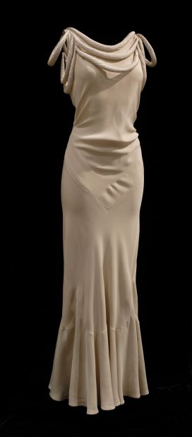 An evening gown of silk crêpe, satin-backed, from 1932, appears in the exhibition. 