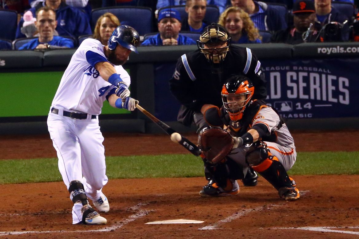 Kansas City Royals third baseman Alex Gordon hits an RBI double in the second inning against the San Francisco Giants during Game 7 of the 2014 World Series at Kauffman Stadium on October 29 in Kansas City, Missouri. 