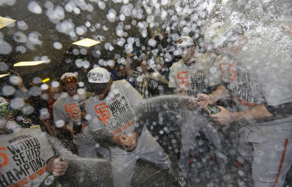 The San Francisco Giants celebrate after Game 7 of the World Series against the Kansas City Royals, October 29, in Kansas City, Missouri. The Giants won 3-2 to win the series.