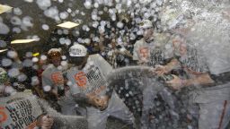 The San Francisco Giants celebrate after Game 7 of the World Series against the Kansas City Royals, October 29 in Kansas City, Mo. The Giants won 3-2 to win the series.