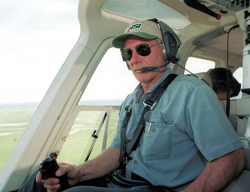 In July 2001, Harrison Ford put his "Indiana Jones"-honed instincts to good use <a href="http://www.people.com/people/article/0,,622199,00.html" target="_blank" target="_blank">by climbing into his helicopter</a> to help a search party looking for a missing 13-year-old Boy Scout outside Wyoming's Yellowstone National Park. When the boy was found almost seven hours later, cold and hungry but OK, Ford greeted him with a hug and a handshake. 