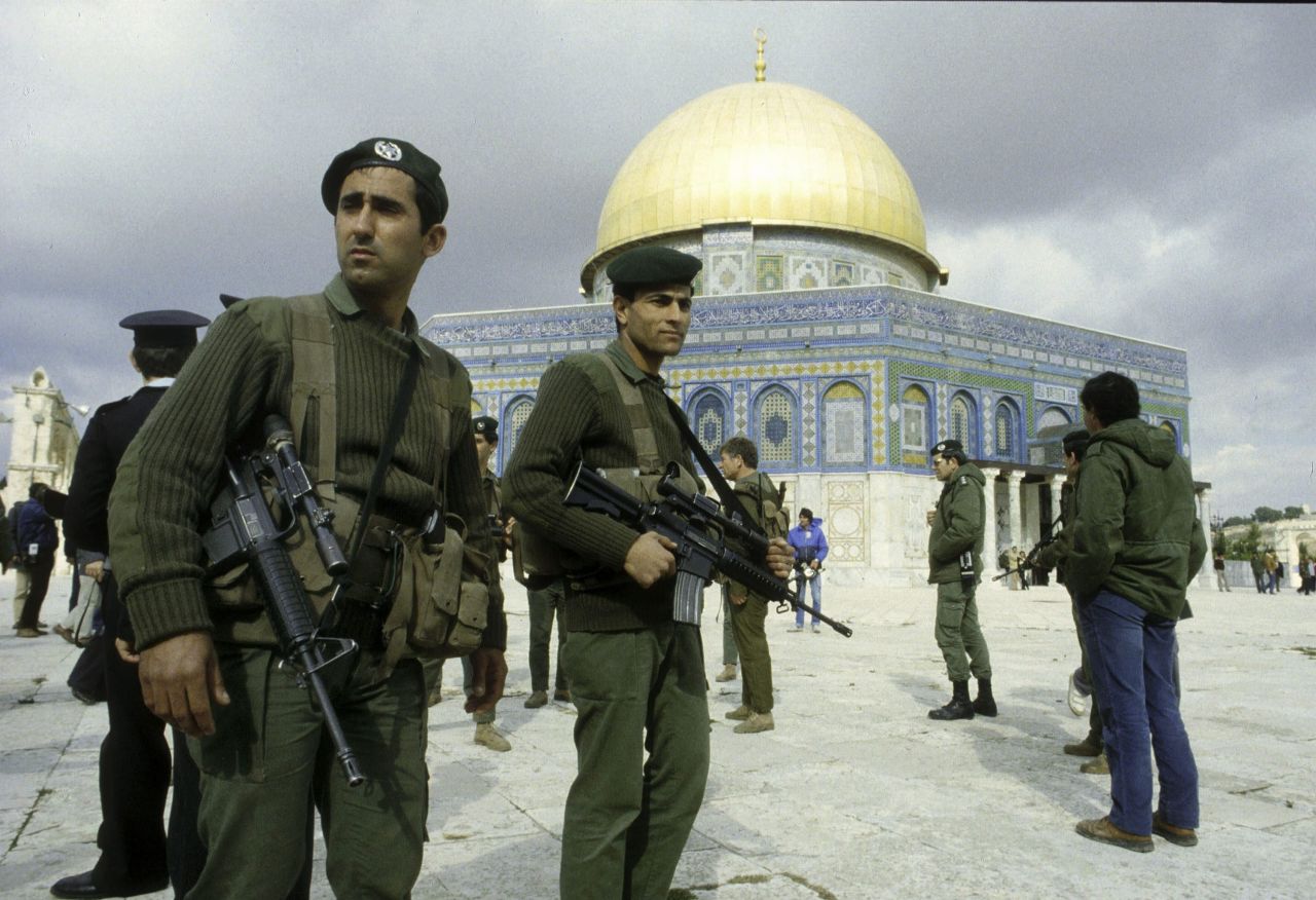 Israeli soldiers are seen in front of the Dome of the Rock in October 1990.