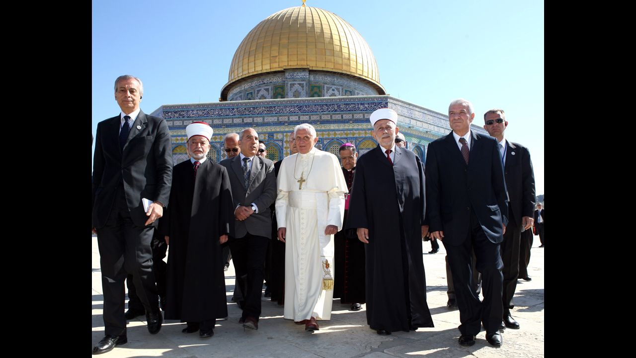 Pope Benedict XVI stands in front of the Dome of the Rock in May 2009.