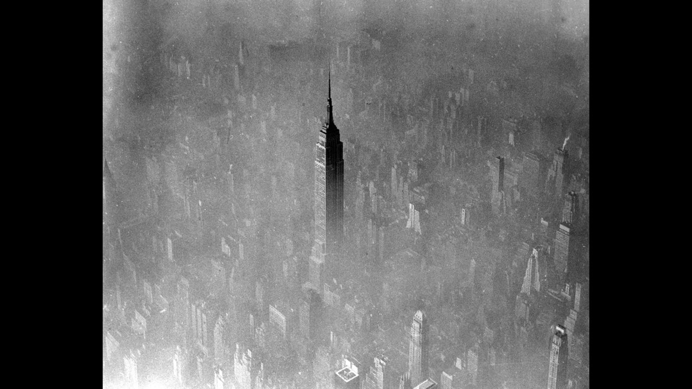 Fog eclipses nearly all of midtown Manhattan except for the 103-story Empire State Building, seen in this 1961 aerial photo.   