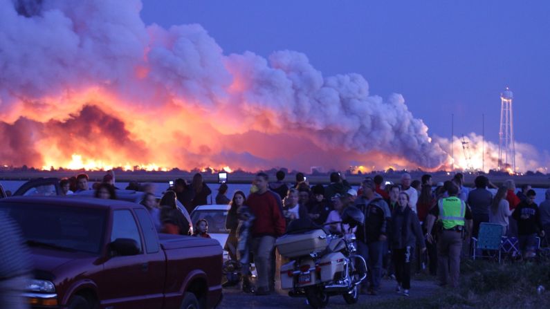 People who came to Wallops Island, Virginia, to watch the launch of a NASA-contracted rocket walk away after the unmanned spacecraft, owned by Orbital Sciences Corp., <a href="http://www.cnn.com/2014/10/29/us/gallery/antares-explosion/index.html">exploded</a> on Tuesday, October 28. The cargo module was carrying 5,000 pounds of supplies and experiments meant for the International Space Station. No one was injured in the explosion, and the cause is under investigation.