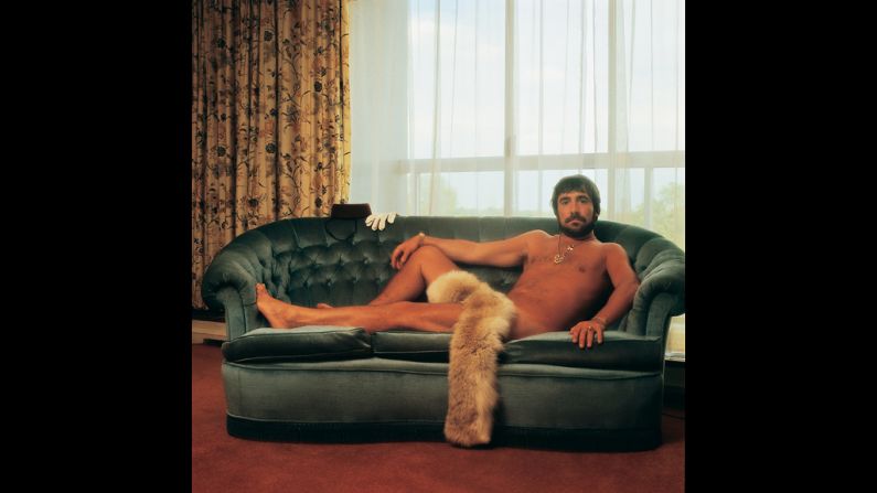 This portrait of Keith Moon, the drummer of The Who, was taken in the Royal Garden Hotel in London in 1976. "The band wanted a sort of Playboy feel, and Keith came up with the idea of getting naked for a centrefold shot," recalls Po. "I turned up at the hotel, and there he was in all his glory. He grabbed his girlfriend's boa and put it over his privates. The picture makes him look like a sedate musician with a beautiful body, but he was mad as a hatter. He spoke with an affected, very posh accent the whole time. There was an upturned chest of drawers on the bed, and for some reason all the sheets and blankets had been stuffed into the toilet."