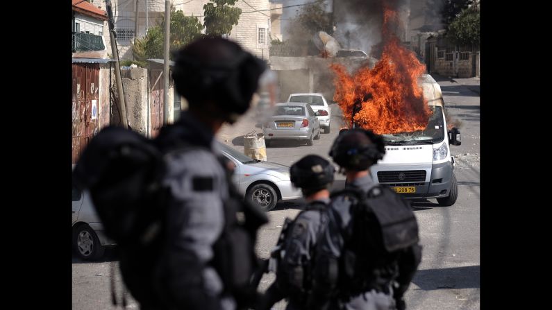 A van burns in Jerusalem during clashes between Palestinians and Israeli security forces on Thursday, October 30. <a href="http://www.cnn.com/2014/10/30/world/meast/temple-mount/index.html">Tension has been building</a> following the drive-by shooting of Rabbi Yehuda Glick, a controversial activist. Israeli police shot and killed a suspect in Glick's shooting, and it closed the Temple Mount holy site "to prevent disturbances." Palestinian President Mahmoud Abbas called the Temple Mount shutdown a "declaration of war." <a href="http://www.cnn.com/2014/10/30/middleeast/gallery/temple-mount/index.html">The Temple Mount</a> is the holiest site in Judaism and the third-holiest site in Islam.