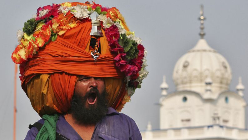 A Sikh warrior yawns Friday, October 24, during a religious procession to mark the Bandi Chhor Divas festival in Amritsar, India.