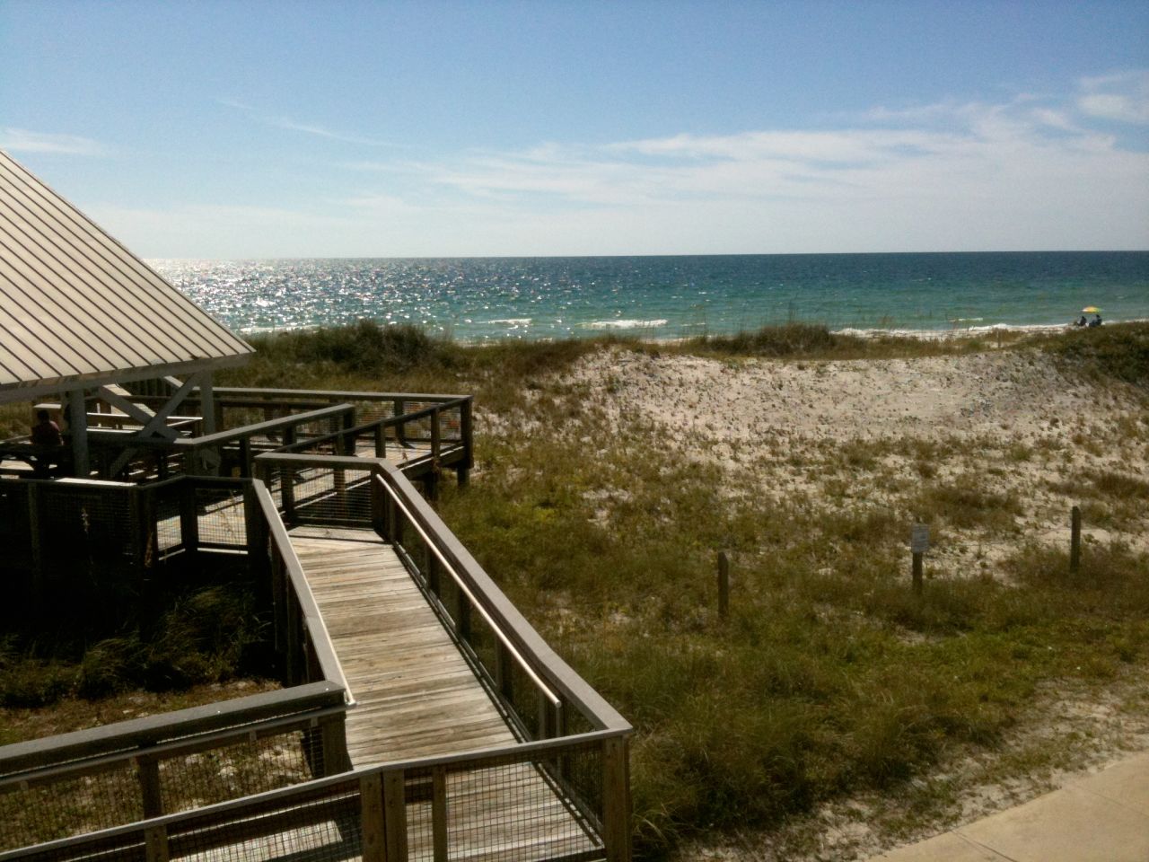 This is the stunning view you get of the Gulf of Mexico as you cross over the carefully preserved dunes at St. George Island State Park, a short drive from Eastpoint and Apalachicola. The water takes on a greenish hue at the shoreline and turns blue as it gets deeper. 
