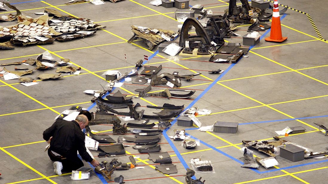 Investigators inspect debris from the space shuttle Columbia, which broke up over East Texas in February 2003. Seven astronauts were killed.