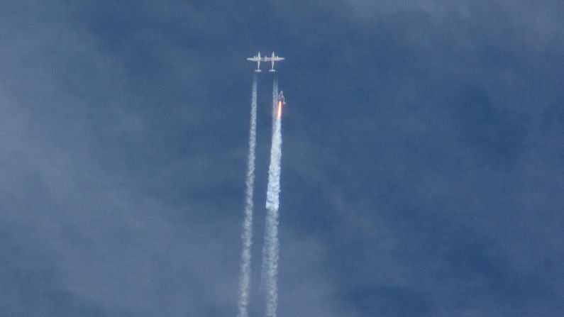 The Virgin Galactic SpaceShipTwo rocket separates from the carrier aircraft before exploding in the air during a test flight on Friday, October 31. The explosion killed a pilot aboard and seriously injured another person while scattering wreckage in Southern California's Mojave Desert, witnesses and officials said.