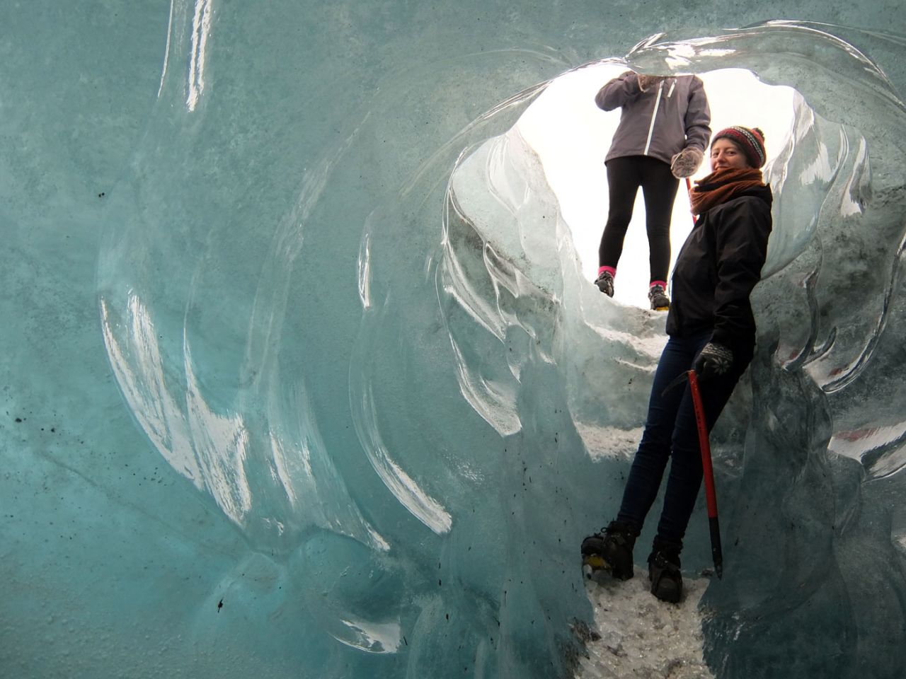 Melting ice can create holes, known as moulins, that plunge down through the glacier. Some are big enough to climb through.