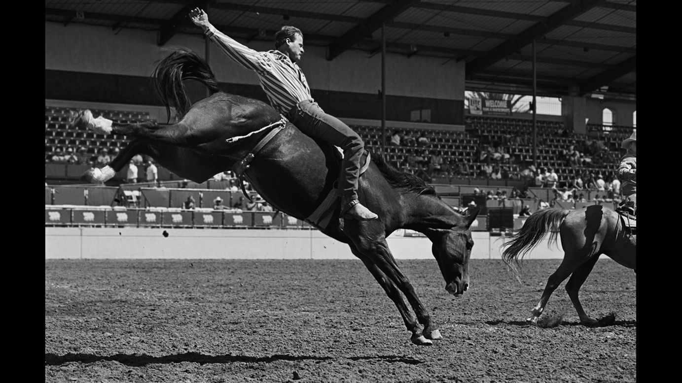 A bareback bronco rider displays perfect form at a gay rodeo event in San Diego in 1990. Photographer Blake Little became fascinated with the gay rodeo circuit in the 1980s, and he even competed and won Bull Riding Champion of the Year in 1990. 