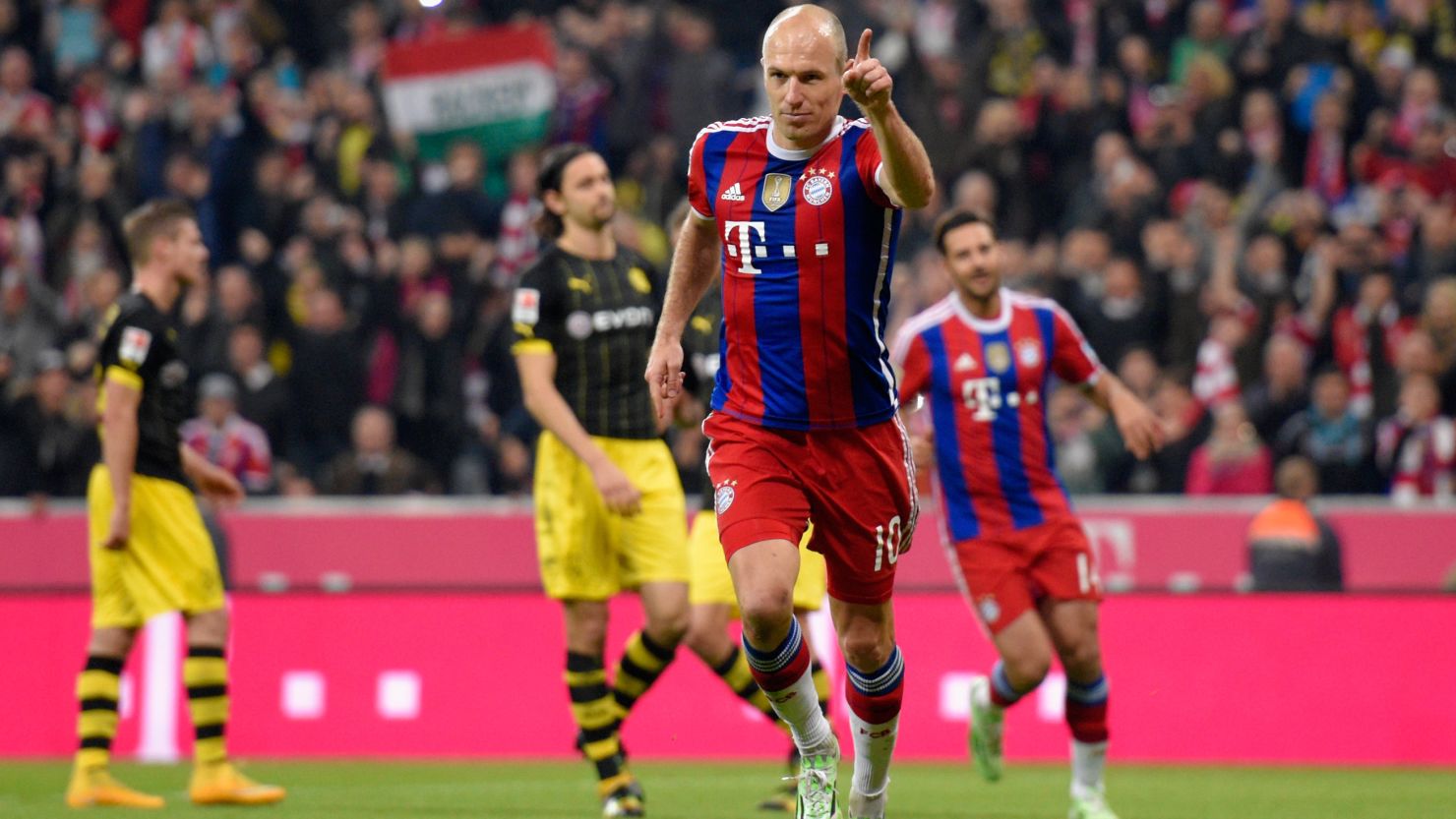 Arjen Robben celebrates scoring the decisive goal against Borussia Dortmund at the Allianz Arena in Munich.