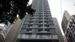 A British man is being questioned after the grisly discovery of two female corpses, including one in a suitcase, in the J Residence building in Hong Kong.