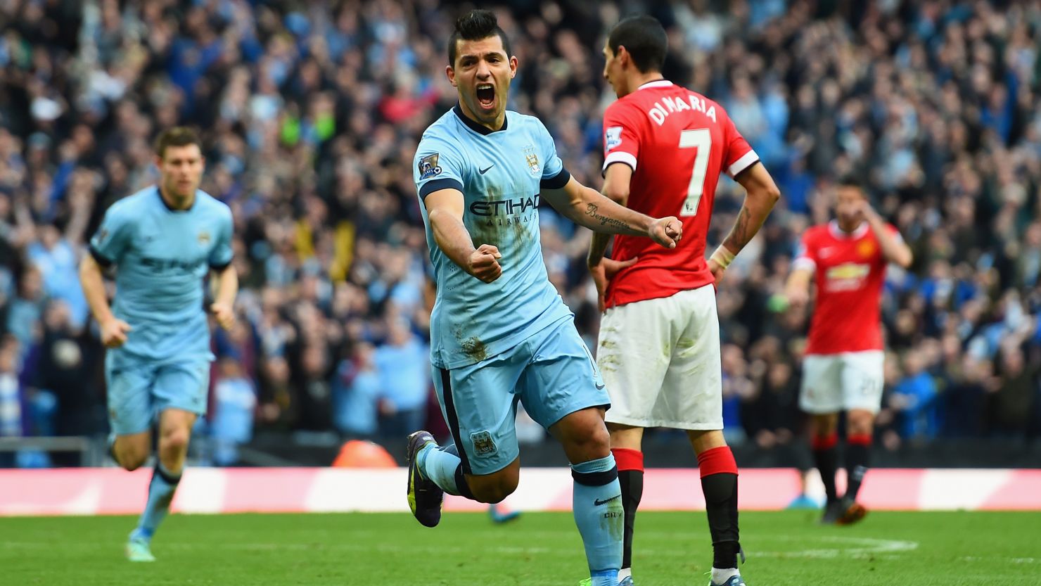 Sergio Aguero celebrates scoring the only goal of the Manchester derby on 2 November 2014.