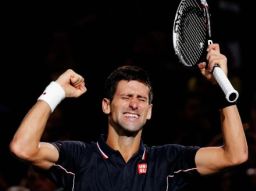 Novak Djokovic celebrates after securing the 2014 Paris Masters title on Sunday 2 November 2014.