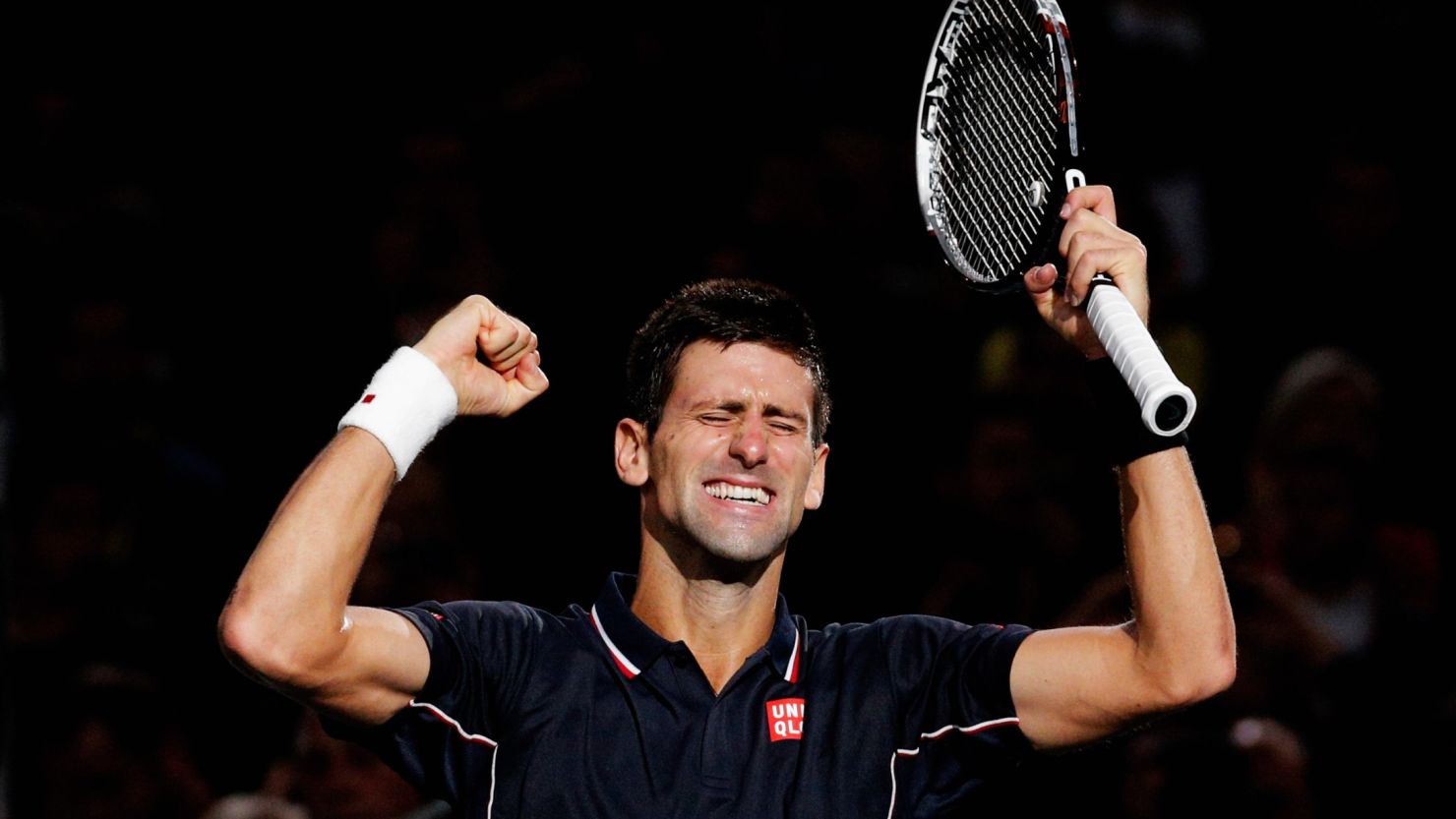 Novak Djokovic celebrates after securing the 2014 Paris Masters title on Sunday 2 November 2014.
