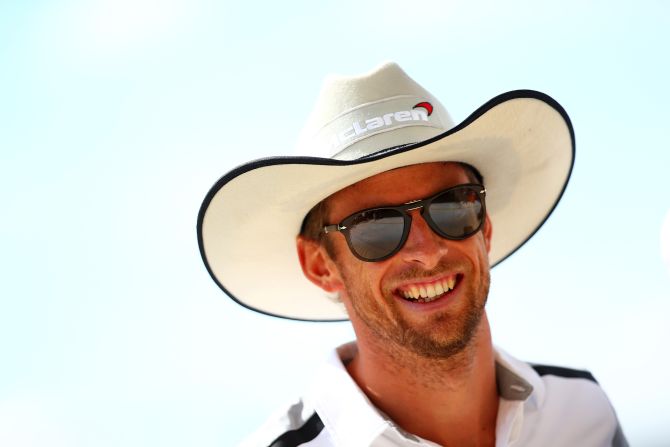 Earlier in the day, Jenson Button of McLaren arrived with his own headwear for the occasion.