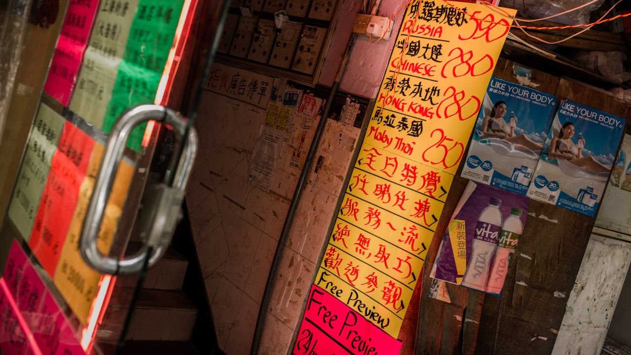A file image of a sign in Wan Chai shows prices for prostitutes of varying nationalities.