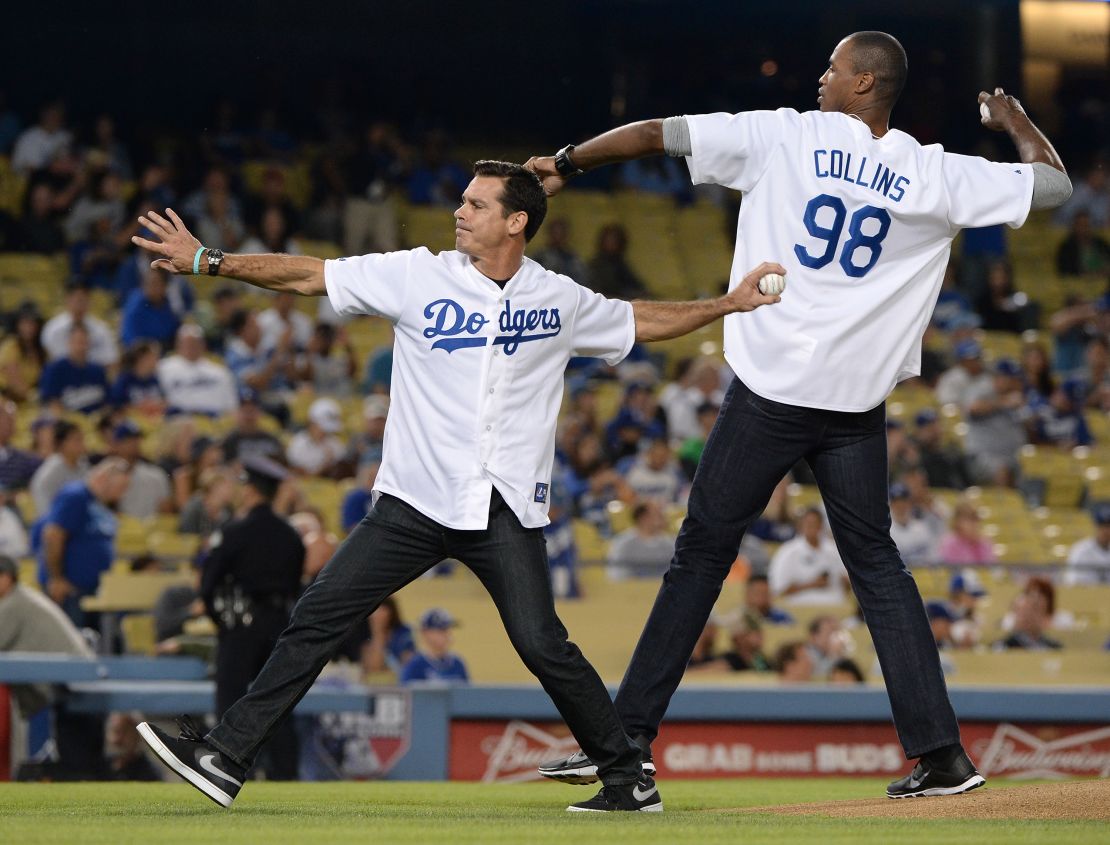 NBA player Jason Collins is pictured with Billy Beane (left), former Major League Baseball player and author of Moneyball 