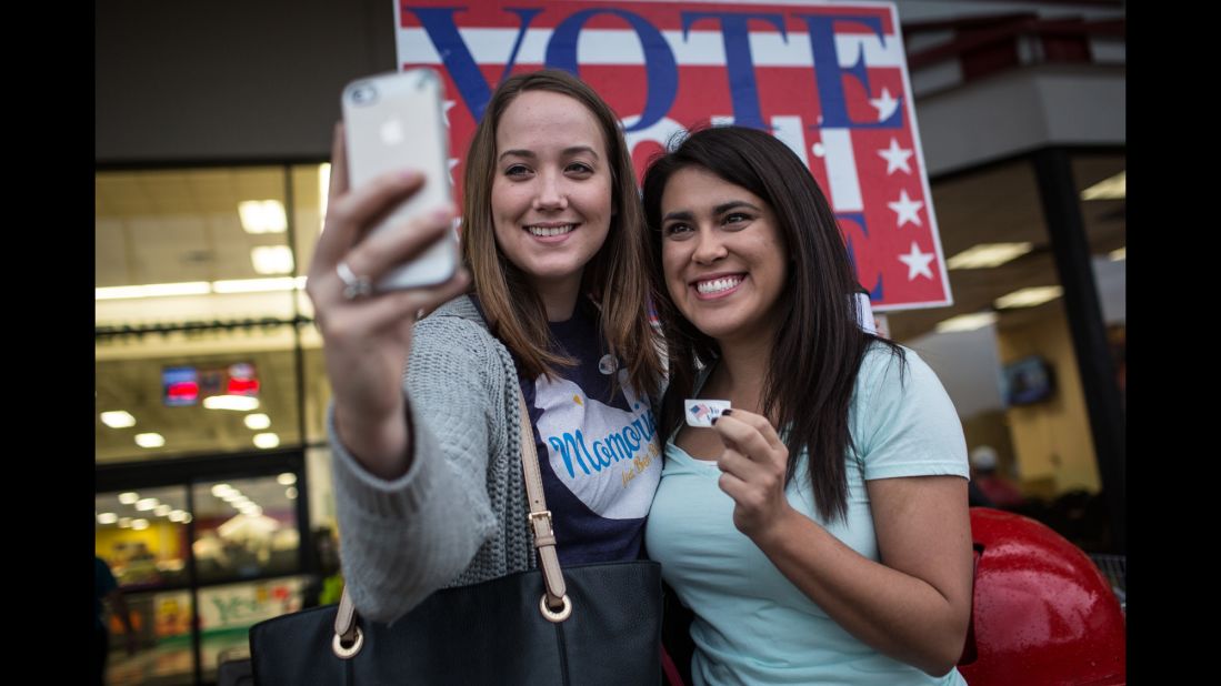 Lauren Koepp and Kara Smyth take a selfie after casting votes in Austin, Texas.