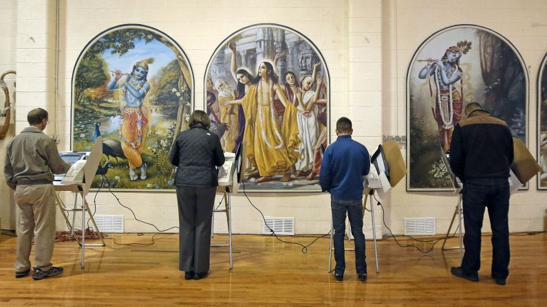 People vote inside the Krishna Temple in Salt Lake City, Utah.