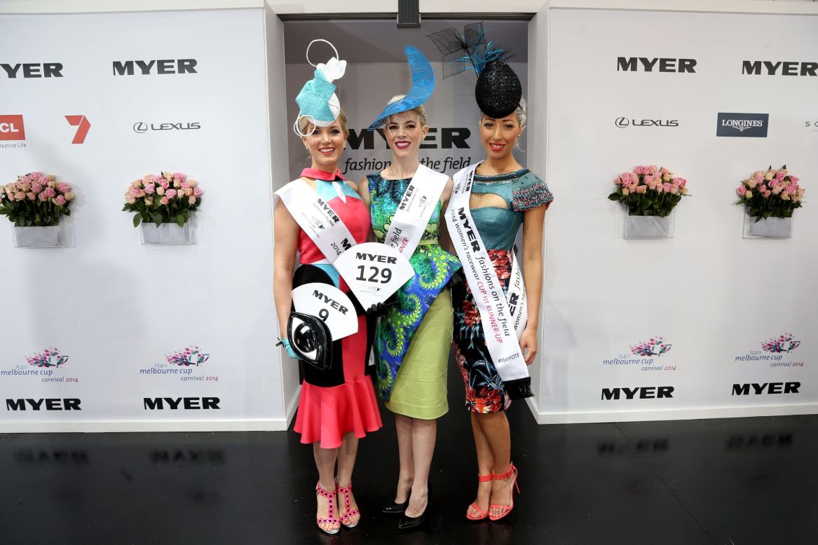 Myer Fashions on the Field Women's Racewear Daily Finalists, second runner up Laura Moss, winner Christine Spielmann and first runner up Milano Imai pose in the Fashion on the Field enclosure.