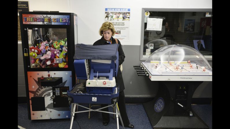 A woman votes at the Oakton Ice Arena in Park Ridge, Illinois.