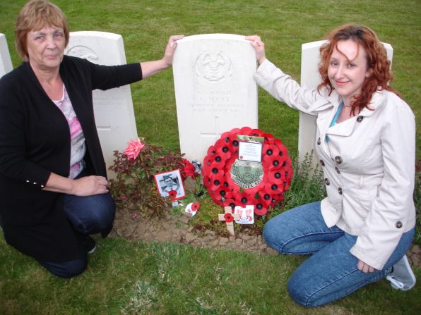 Pat and Pamela Smith visit the grave of their ancestor -- Orient's George Scott. Scott was taken prisoner on August 16 1916 by the Germans and was never seen again.