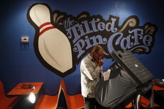 A voter looks over his ballot at Fugate's Bowling Alley in Hazard, Kentucky.