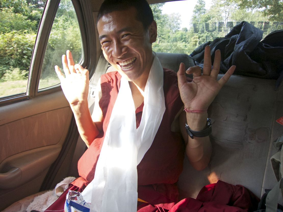Exiled Tibetan monk, Lobsang Rabten, 27, says: "The Dalai Lama's compassion teachings give me strength."
