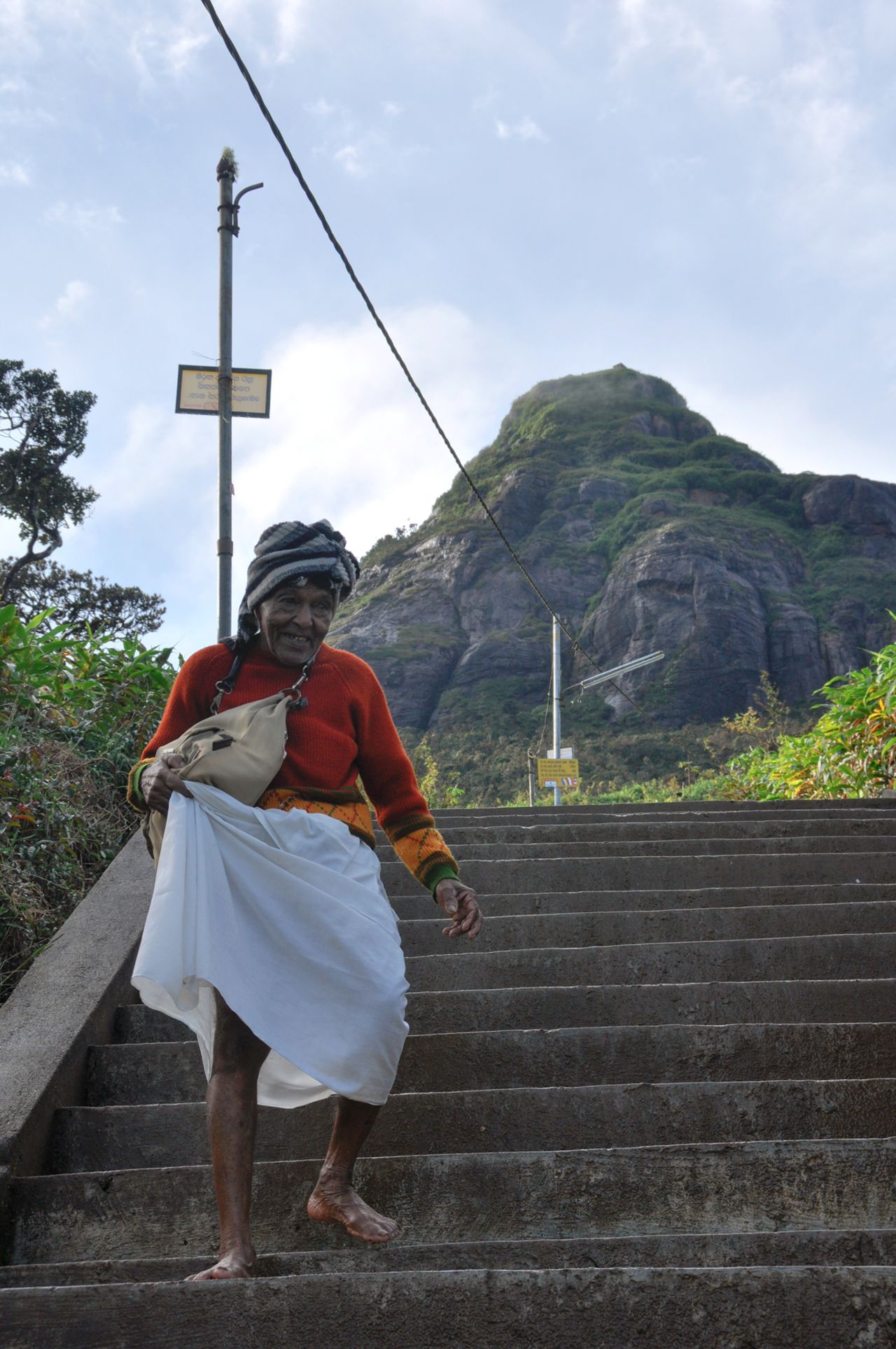 Many of the thousands of  pilgrims who daily flock to Adam's Peak tackle the route barefoot.
