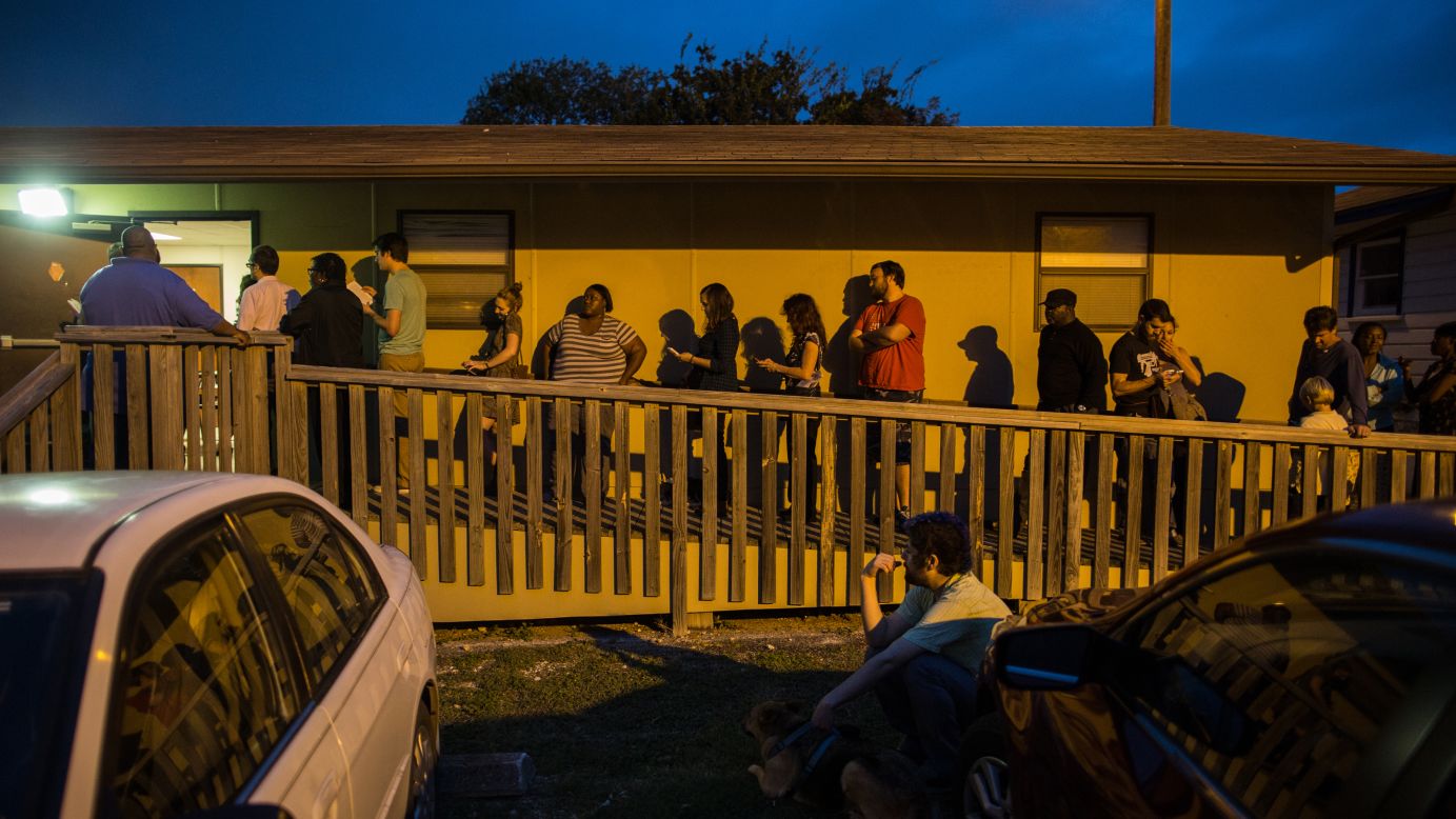 Voters wait in line to cast their ballots in a portable structure outside of David Chapel Baptist Church in Austin, Texas. 