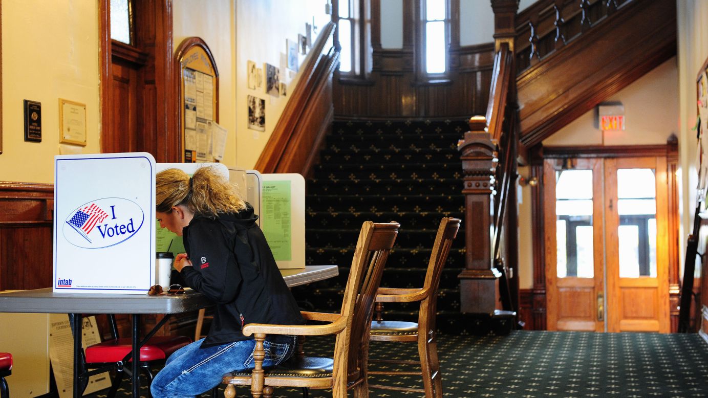 Samantha Mongoven casts her vote in the hallway of the historic courthouse in Boulder, Montana, on Tuesday, November 4. Millions of people nationwide are taking part in the 2014 midterm elections.
