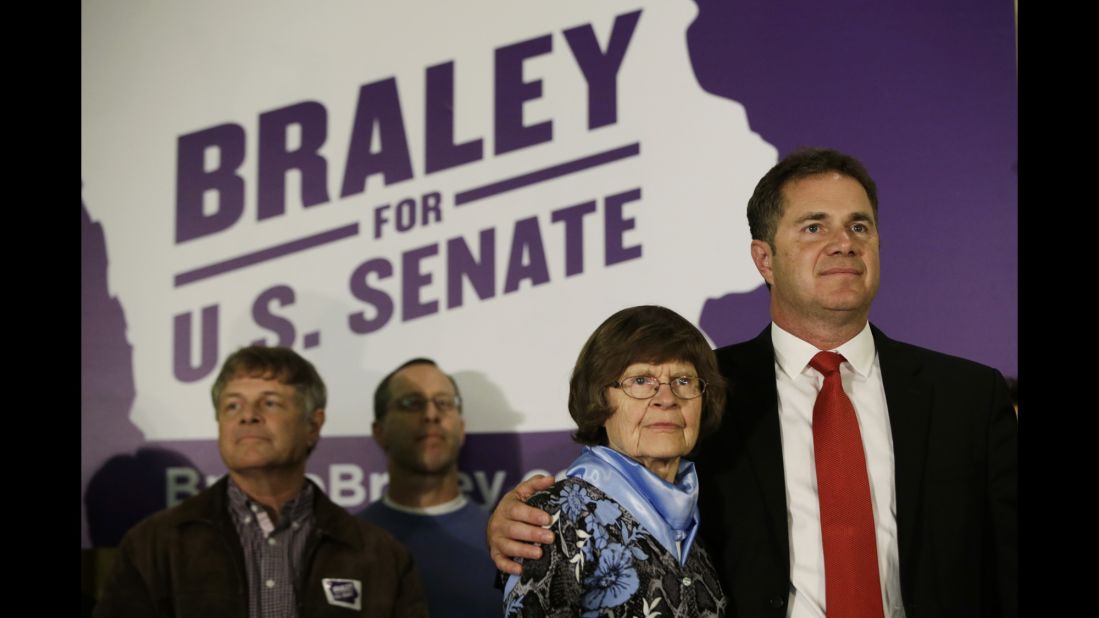 Braley hugs his mom, Marcia, before addressing supporters in Des Moines, Iowa, on November 4.