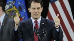 Wisconsin Republican Gov. Scott Walker gives a thumbs up as he speaks at his campaign party in West Allis, Wisconsin, on Tuesday, November 4. Walker defeated Democratic gubernatorial challenger Mary Burke.
