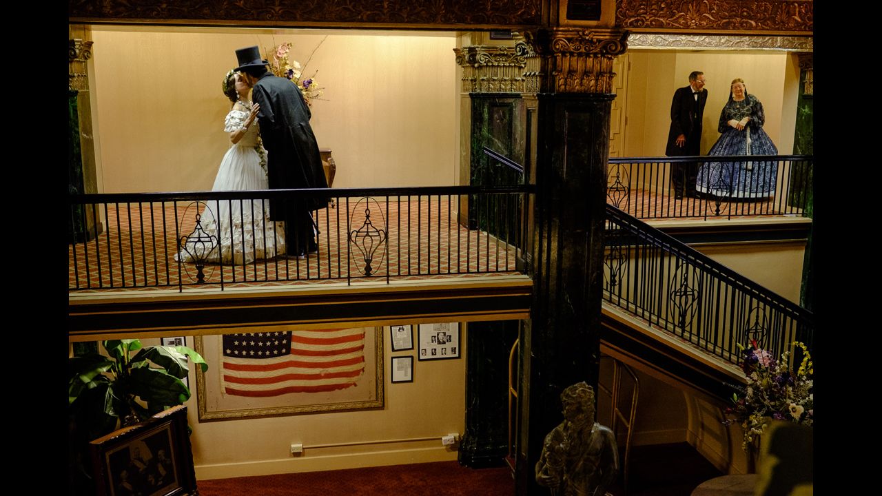 An Abe and Mary kiss outside of a ballroom at the Eola Hotel in Natchez. 