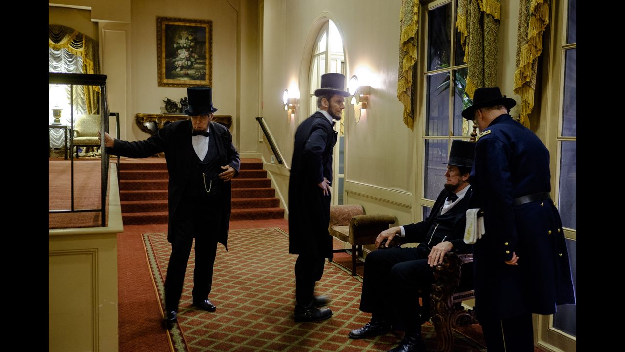 Lincoln impersonators mingle in the Eola Hotel lobby.