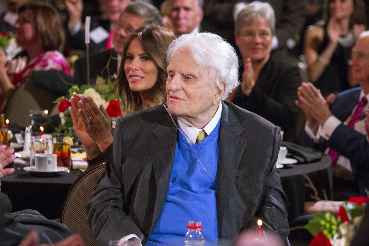 Well-wishers gather with Graham at his 95th birthday celebration in 2013.
