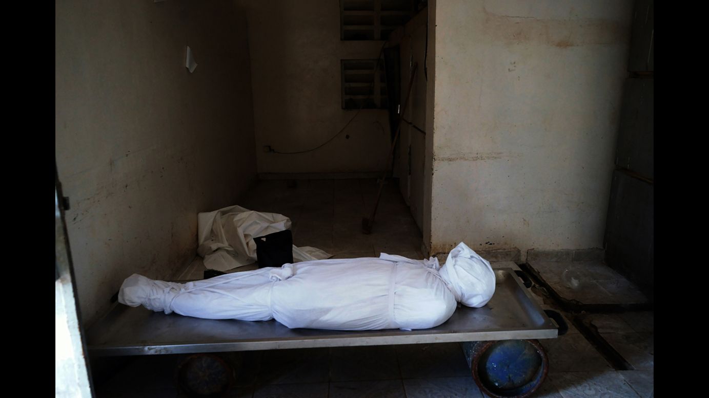 The body of a man who died of Ebola lays in the mortuary. (Luigi Baldelli/ECHO)