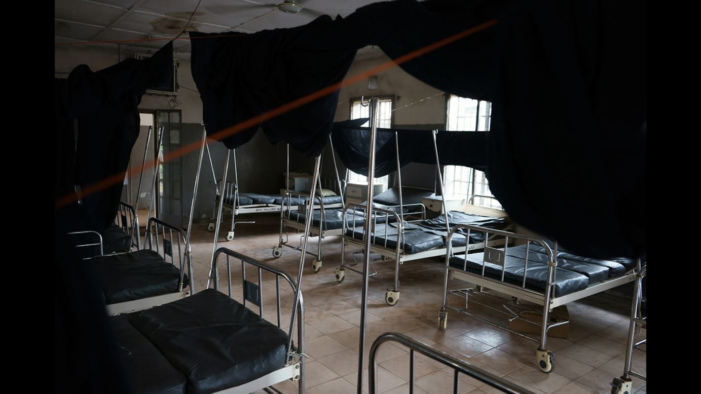 Empty beds are seen in a hospital. Many people do not want to be hospitalized because they are afraid of contracting the Ebola virus. (Luigi Baldelli/ECHO)