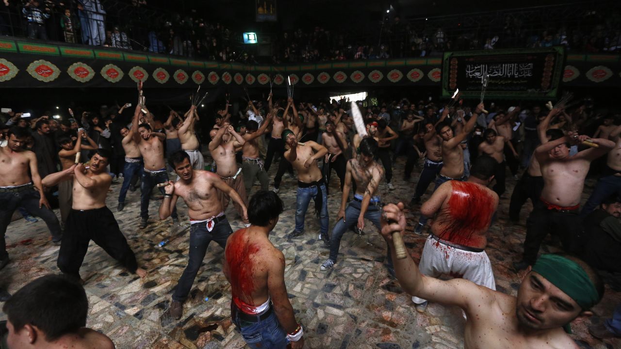 Afghan Shi'ite Muslim men flagellate themselves during a Muharram procession in Kabul on Friday, October 31. Ashura, which falls on the 10th day of the Islamic month of Muharram, commemorates the death of Imam Hussain, grandson of Prophet Mohammed, who was killed in the 7th century battle of Karbala.