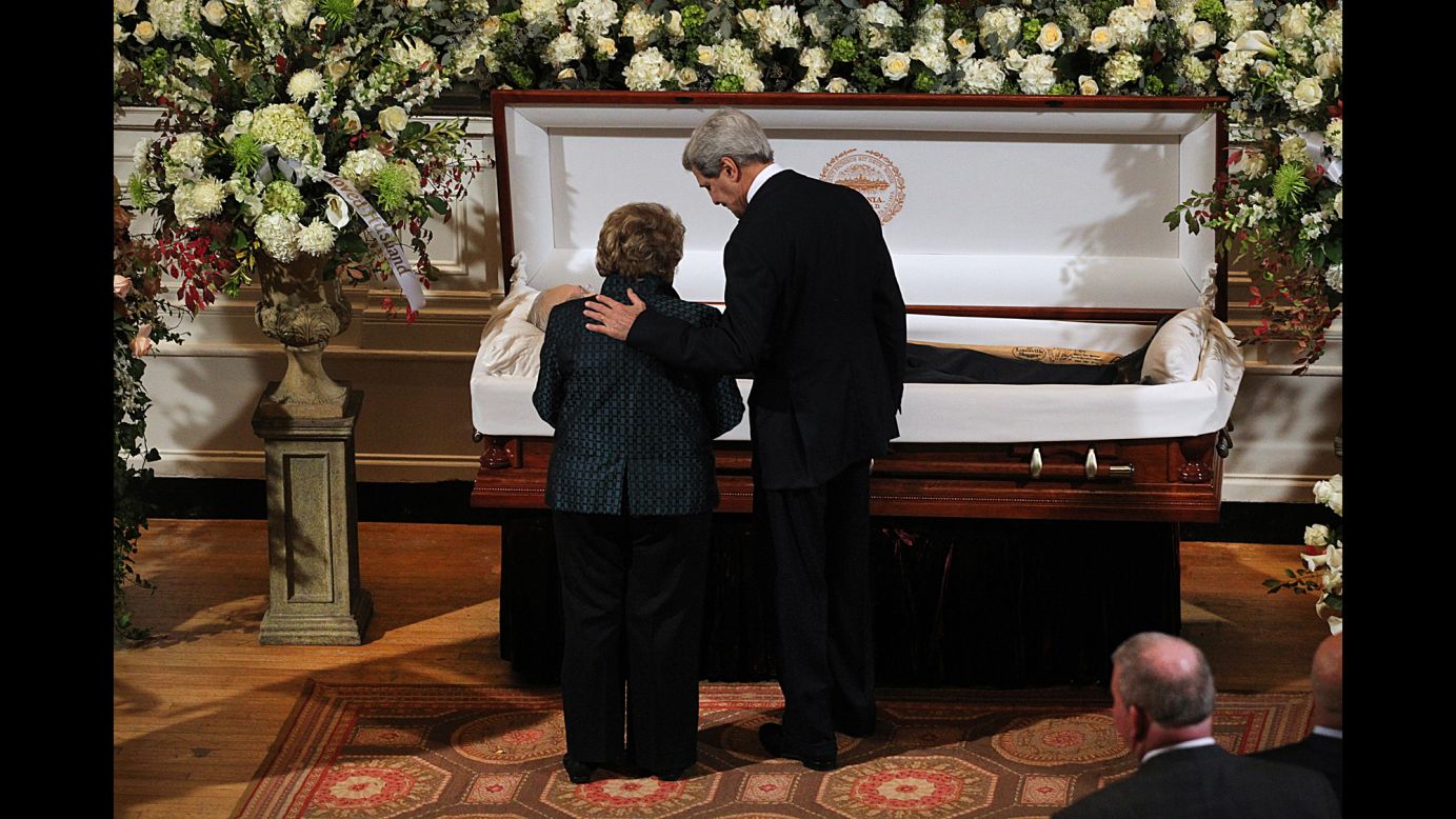 U.S. Secretary of State John Kerry and widow Angela Menino stand at former Boston Mayor Tom Menino's casket at Faneuil Hall in Boston on Sunday, November 2. Menino, the longest-serving mayor in Boston history, died Thursday, October 30. He was 71.