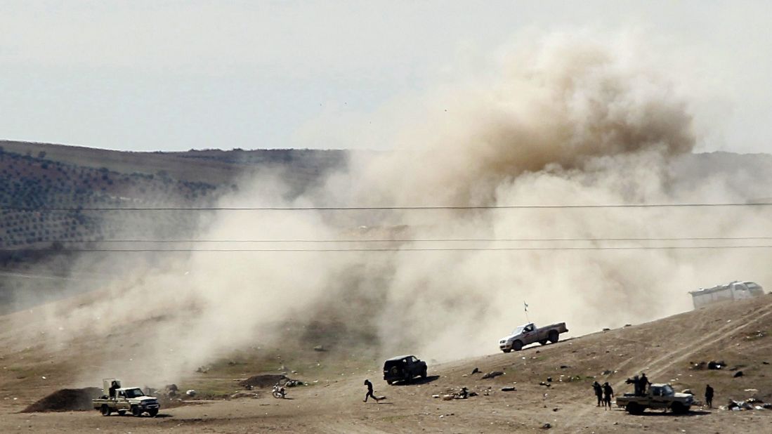 A picture taken from Turkey shows smoke rising after ISIS militants fired mortar shells toward an area controlled by Syrian Kurdish fighters near Kobani on Monday, November 3.